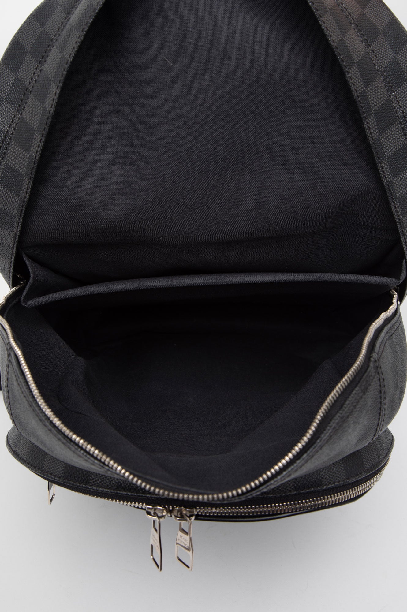 Louis Vuitton Michael Damier Graphite backpack with open front zipper on a white background