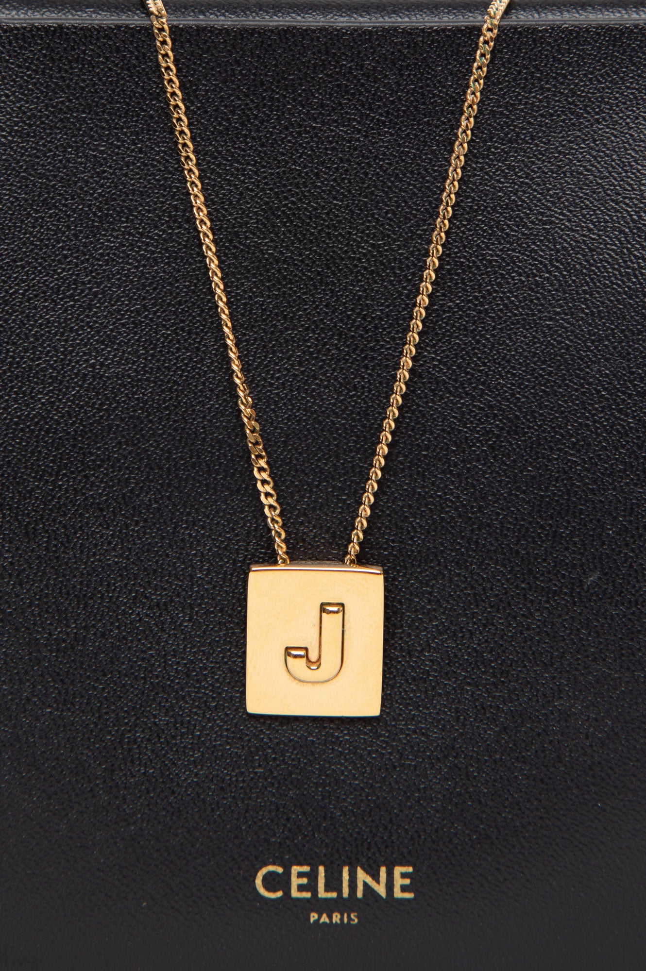 Celine Alphabet J Necklace in Brass with Gold finish