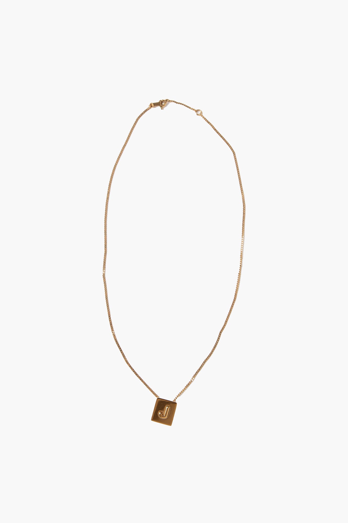 Celine Alphabet J Necklace in Brass with Gold finish