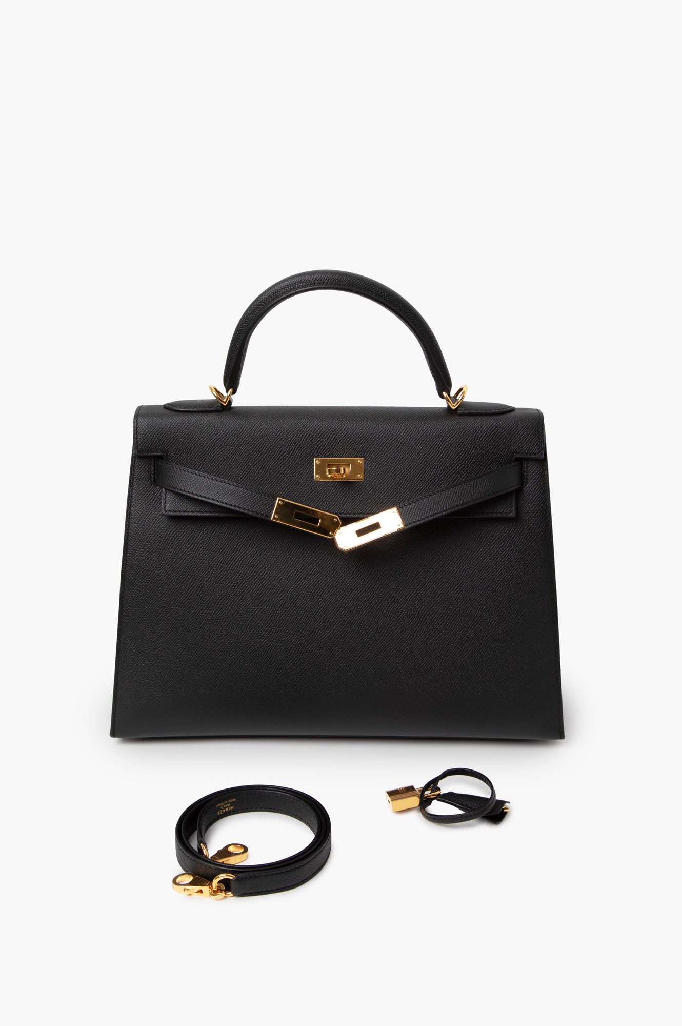 Hermes Kelly 32 Handbag Noir in textured Ardennes leather, detailed with gold hardware and including a detachable shoulder strap,