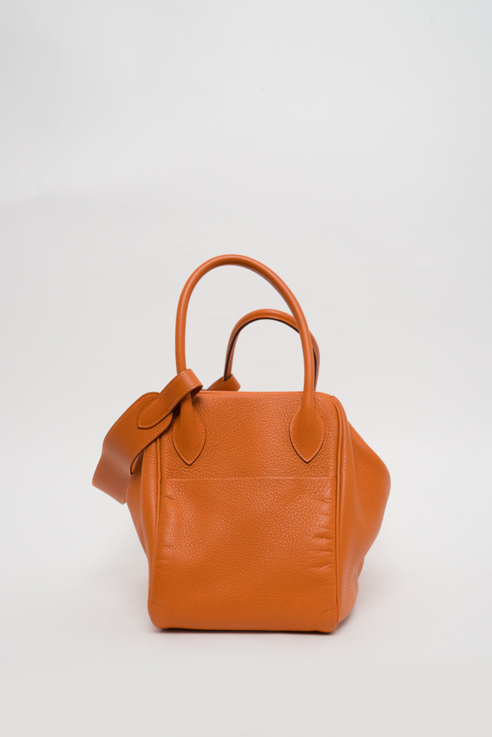 Side view of Hermes Orange Lindy 34 Clemence Leather