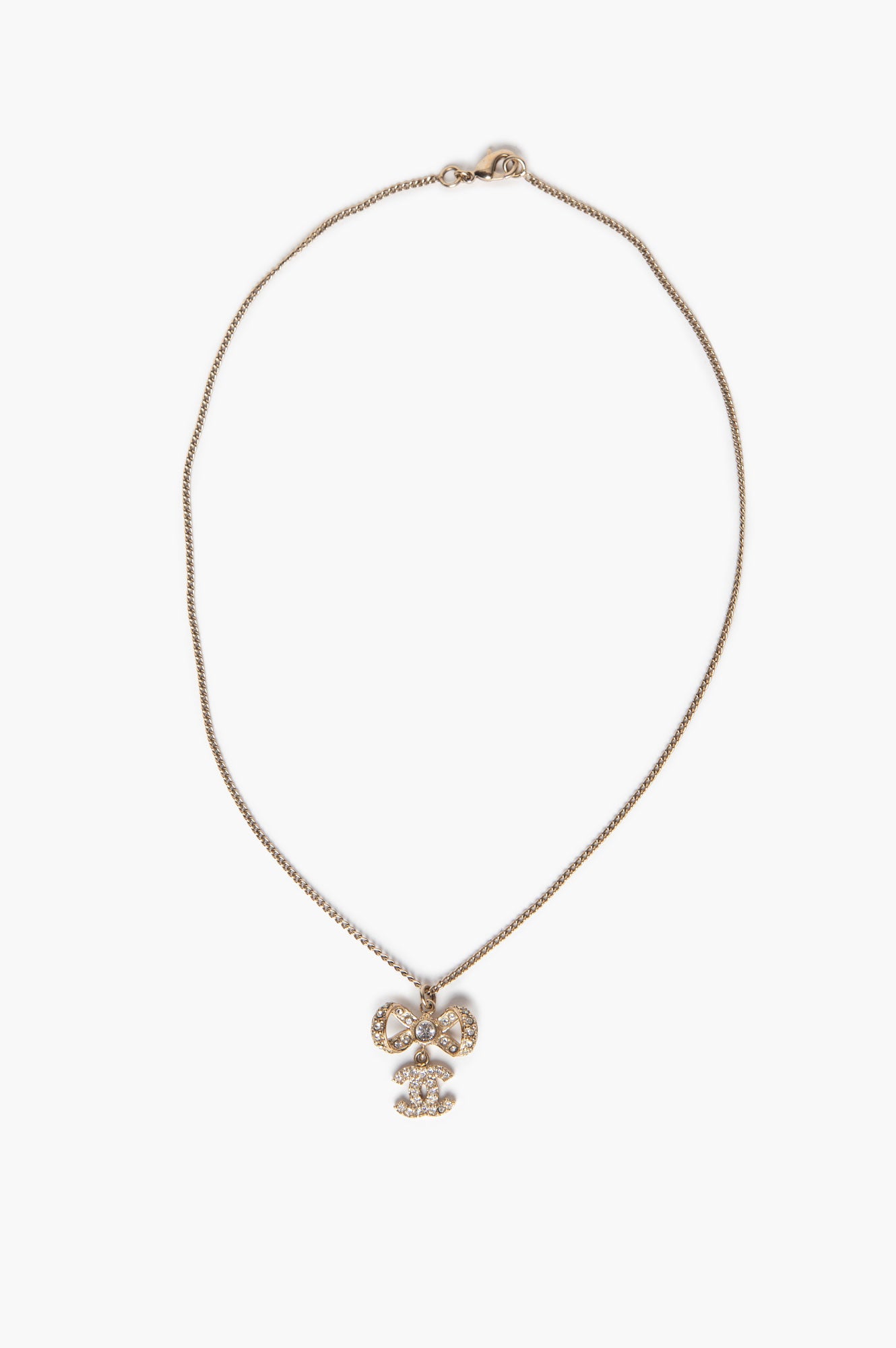 Chanel B12 P Champagne Gold-Tone Crystal CC Logo Bow Necklace