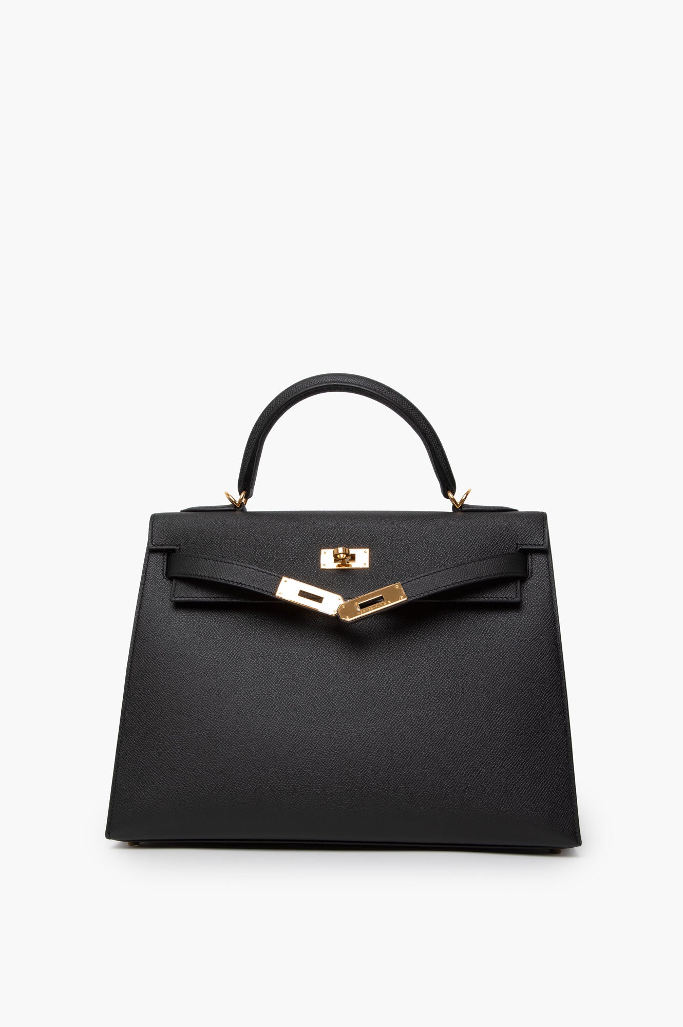 Hermes Kelly 32 Handbag Noir in Ardennes leather, featuring gold-tone hardware and a classic turn-lock closure, displayed against a neutral background.